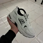 530 نيوبلانس رجالى اسود