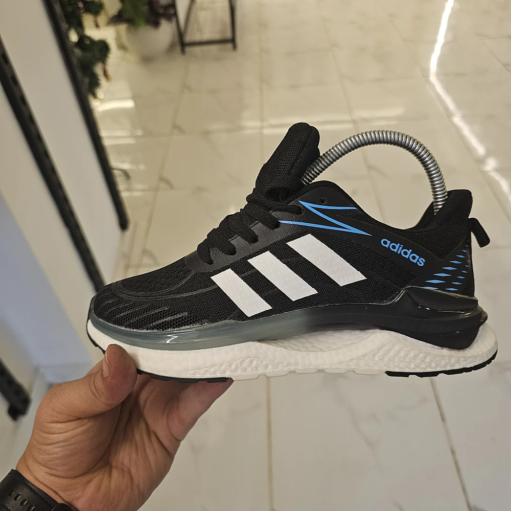 webp_161_20260203_155246_142 adidas ميرور yz24 اسود ابيض - الصورة 1